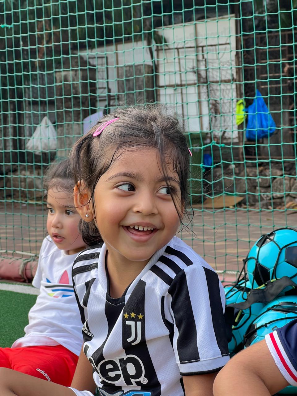Happy child celebrating during football session